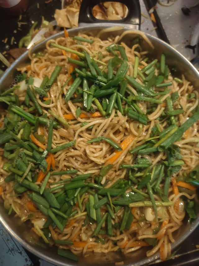 Delicious Chilli Garlic Noodles prepared by COOX