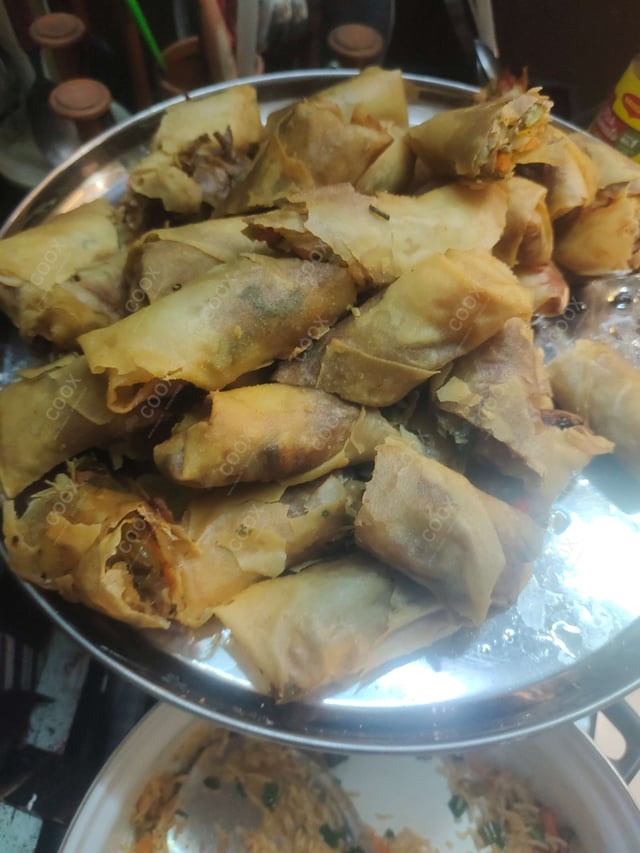 Delicious Veg Spring Rolls prepared by COOX