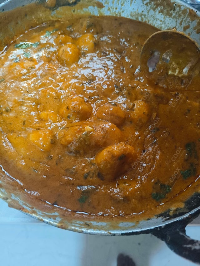 Delicious Dum Aloo prepared by COOX