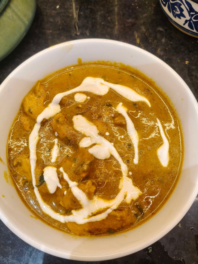 Delicious Butter Chicken prepared by COOX