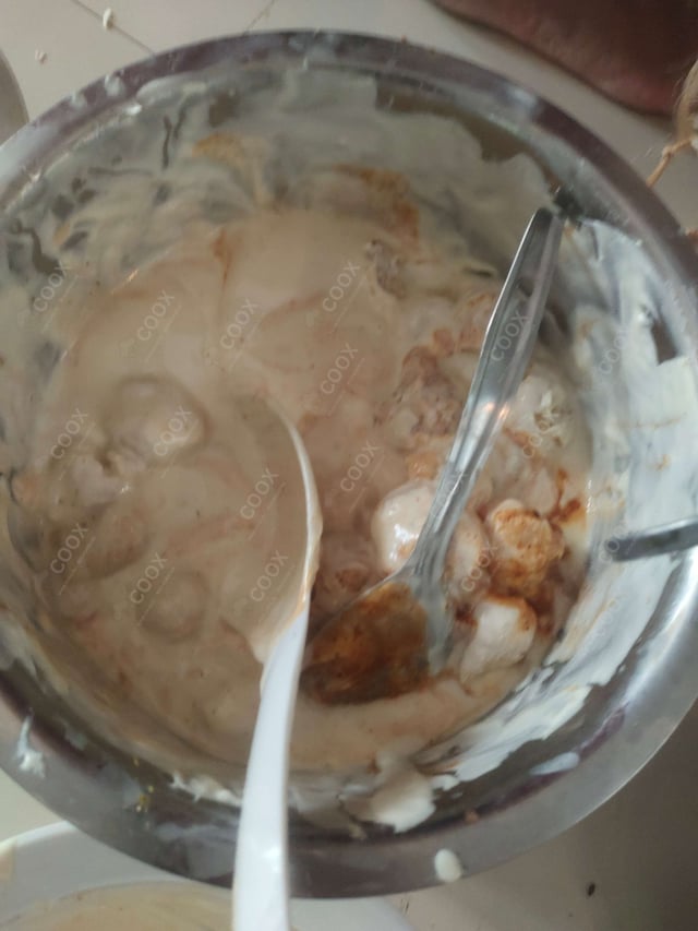 Delicious Dahi Bhalla prepared by COOX