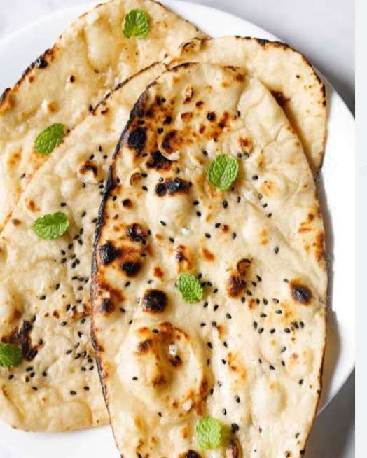Tasty Naan (Butter / Garlic) cooked by COOX chefs cooks during occasions parties events at home