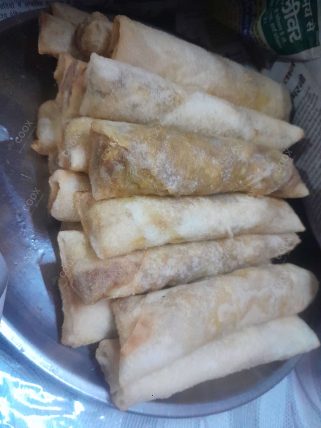 Delicious Veg Spring Rolls prepared by COOX
