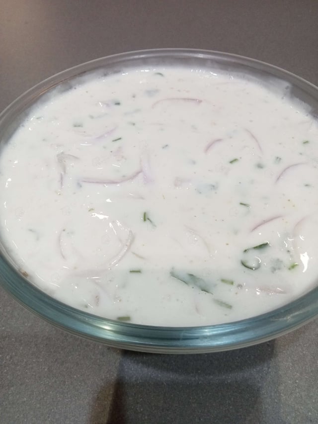 Tasty Onion Raita cooked by COOX chefs cooks during occasions parties events at home