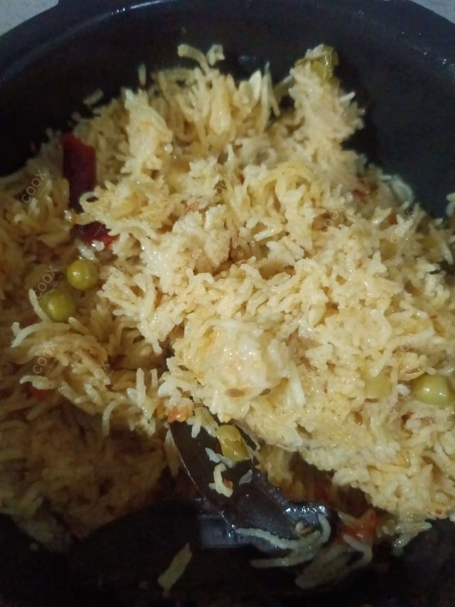 Delicious Jeera Rice prepared by COOX