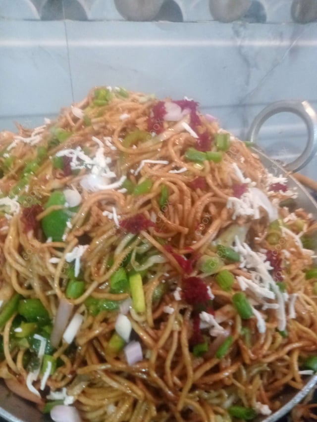 Delicious Veg Hakka Noodles prepared by COOX