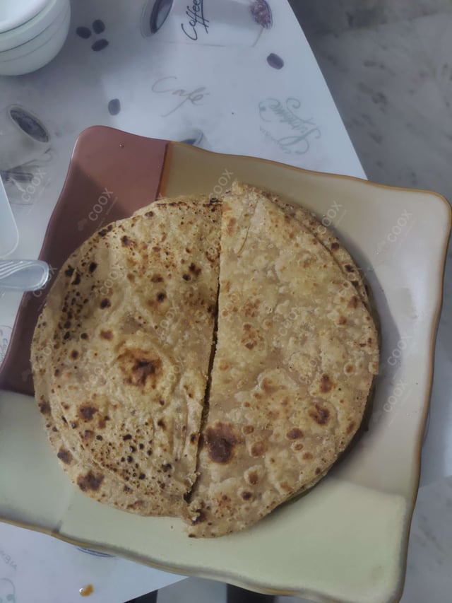 Delicious Kulcha prepared by COOX