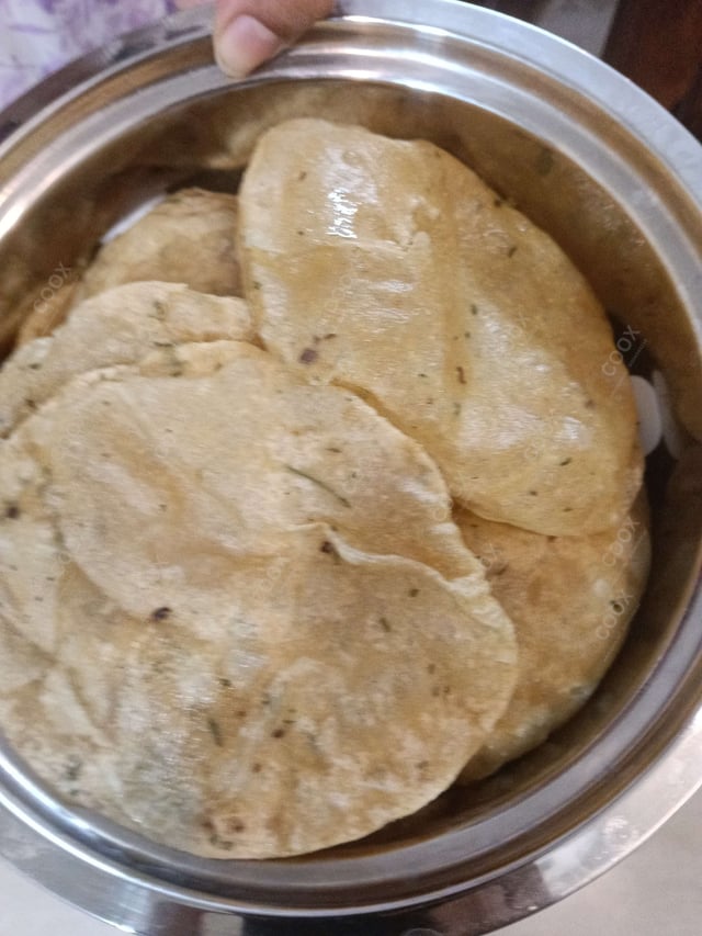 Delicious Pooris & Bedmis prepared by COOX