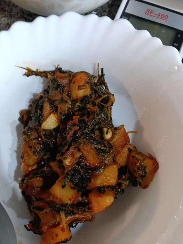 Delicious Aloo Methi prepared by COOX