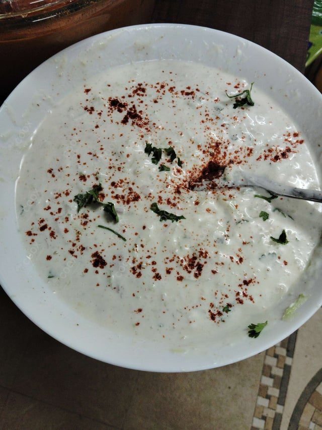 Delicious Cucumber Raita prepared by COOX