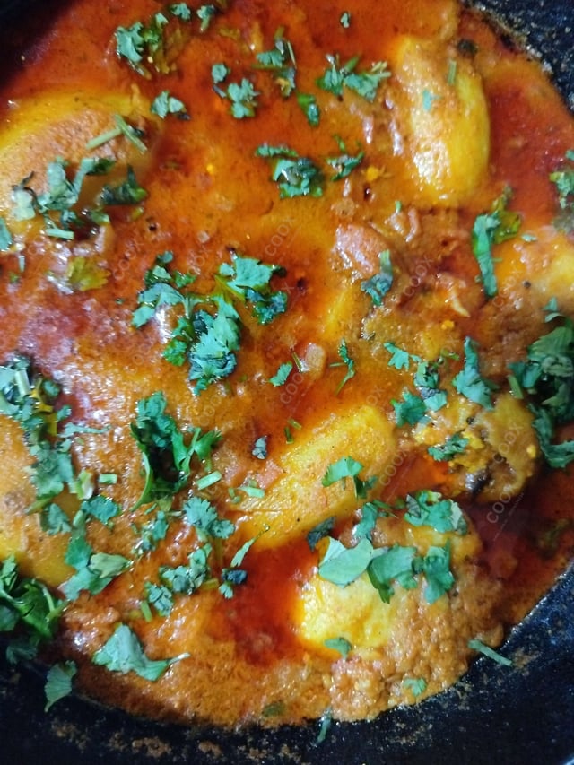 Delicious Stuffed Potatoes (Gravy) prepared by COOX