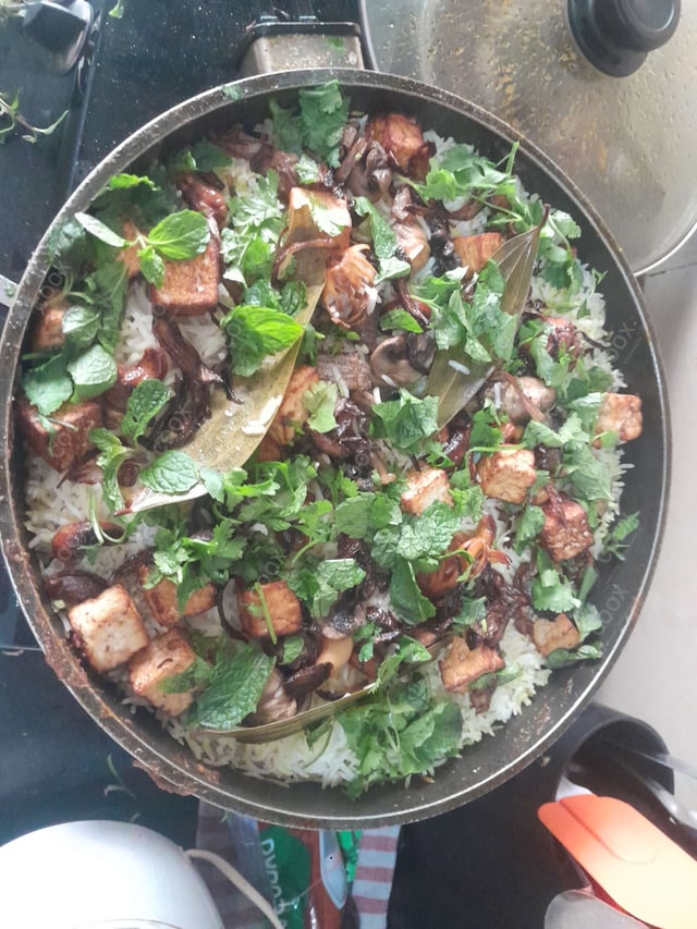 Delicious Veg Biryani prepared by COOX