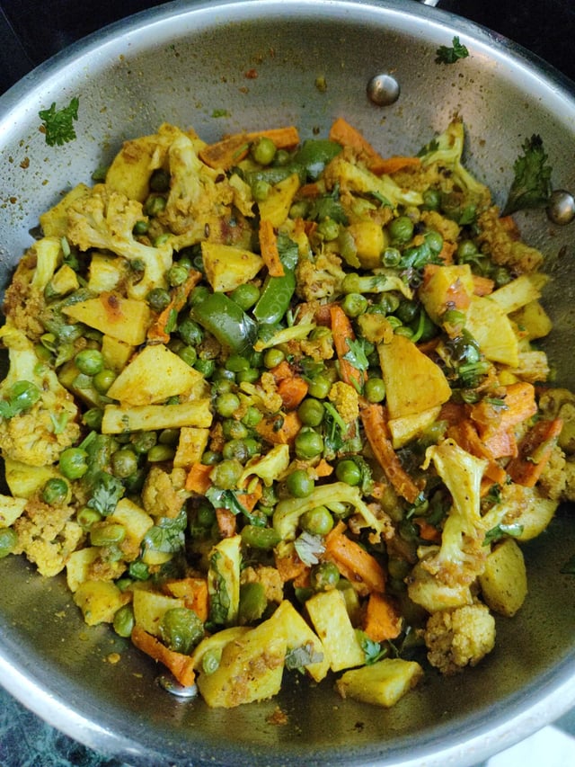 Tasty Aloo Patta Gobhi cooked by COOX chefs cooks during occasions parties events at home