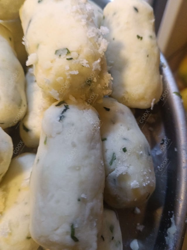 Delicious Malai Kofta (Orange Gravy) prepared by COOX