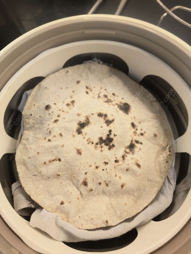 Delicious Tawa Rotis prepared by COOX