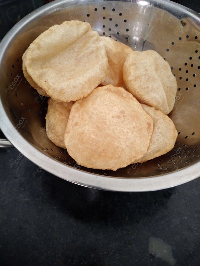 Delicious Pooris & Bedmis prepared by COOX