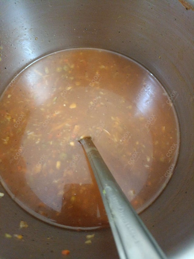 Delicious Vegetable Manchow Soup prepared by COOX