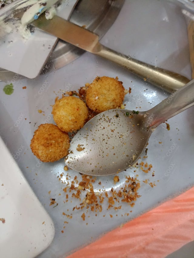 Delicious Dahi ke Sholey prepared by COOX