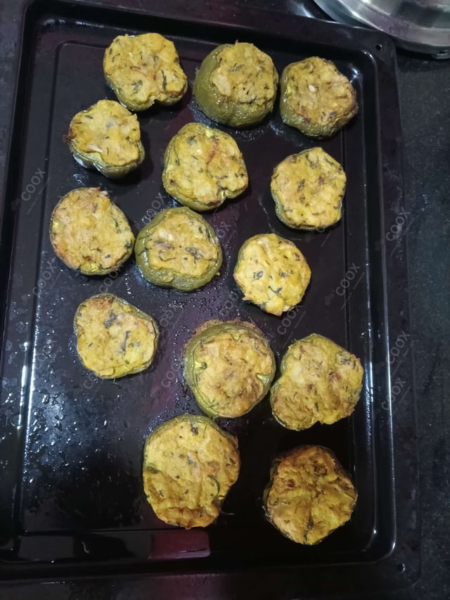 Tasty Bharwa Shimla Mirch cooked by COOX chefs cooks during occasions parties events at home