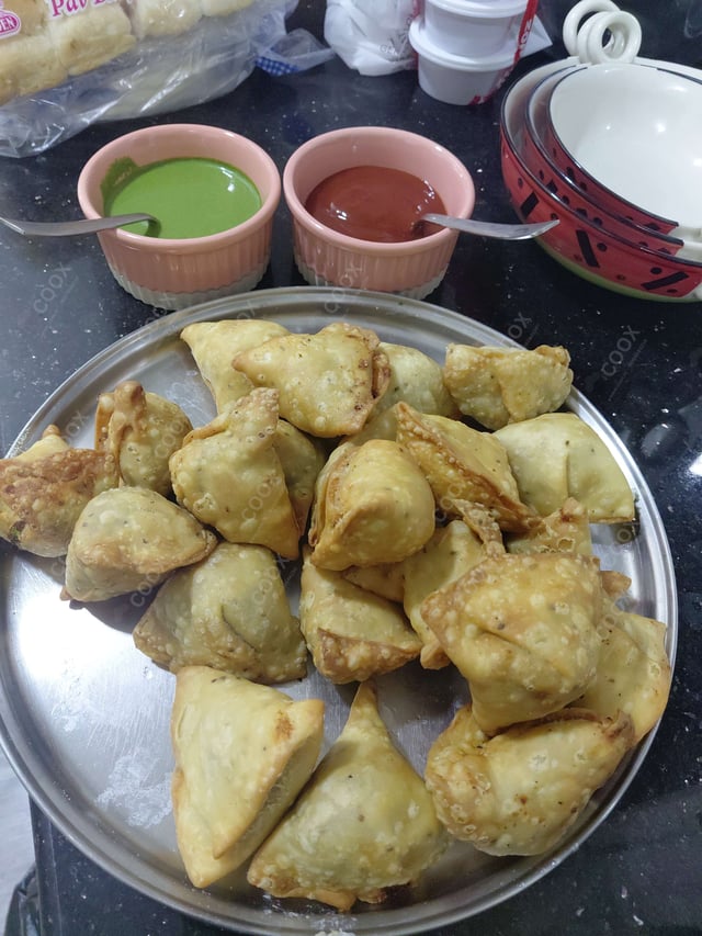 Delicious Mini Samosas prepared by COOX