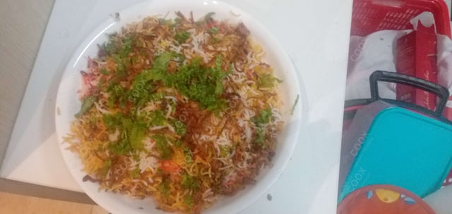 Tasty Mutton Biryani cooked by COOX chefs cooks during occasions parties events at home