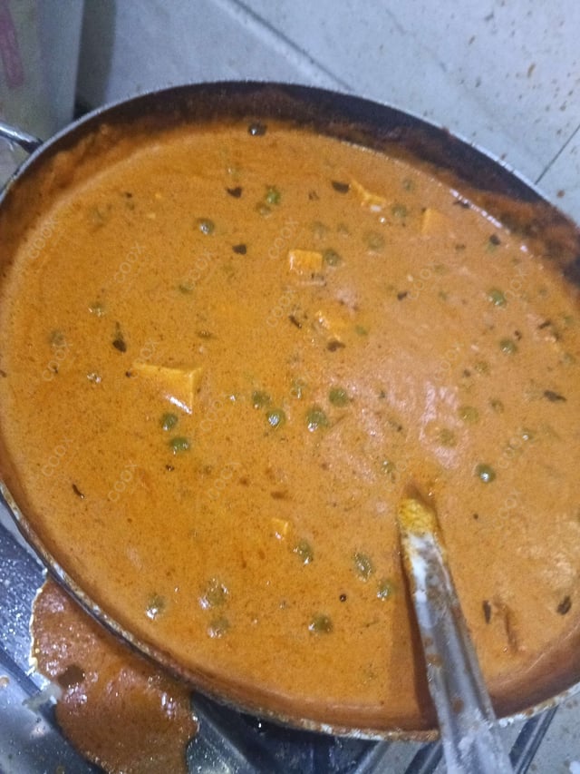 Delicious Matar Paneer prepared by COOX