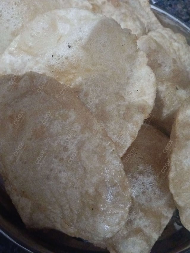 Delicious Pooris & Bedmis prepared by COOX