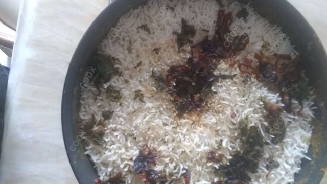 Tasty Chicken Biryani cooked by COOX chefs cooks during occasions parties events at home