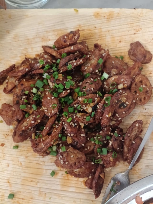 Delicious Chilli Lotus Stem prepared by COOX