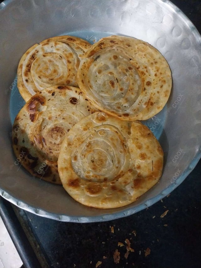 Delicious Lachha Paranthas prepared by COOX