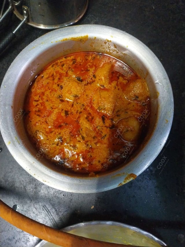 Delicious Dum Aloo prepared by COOX