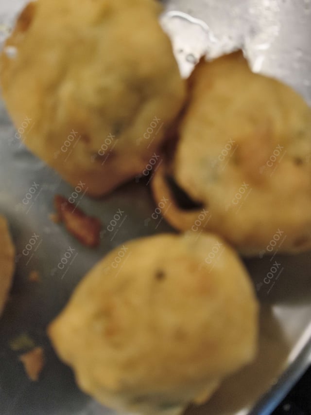 Tasty Aloo Bonda cooked by COOX chefs cooks during occasions parties events at home
