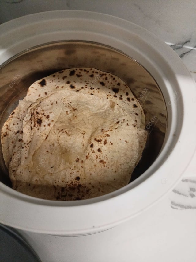 Delicious Makki ki Rotis prepared by COOX