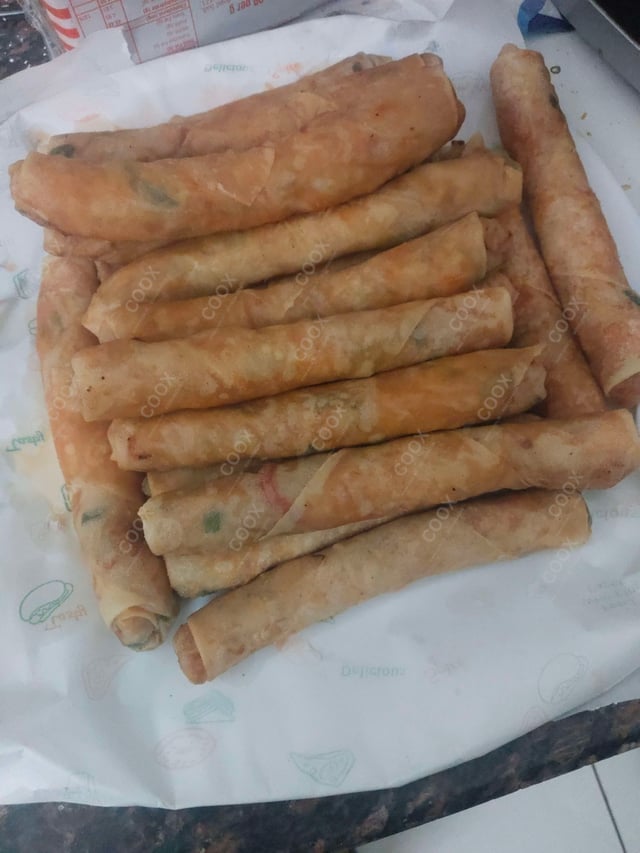 Delicious Veg Spring Rolls prepared by COOX