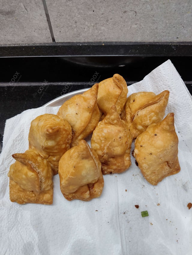 Delicious Mini Samosas prepared by COOX