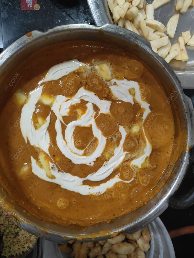 Tasty Paneer Butter Masala cooked by COOX chefs cooks during occasions parties events at home