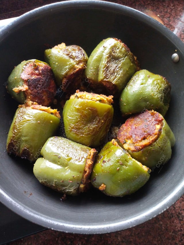 Delicious Bharwa Shimla Mirch prepared by COOX