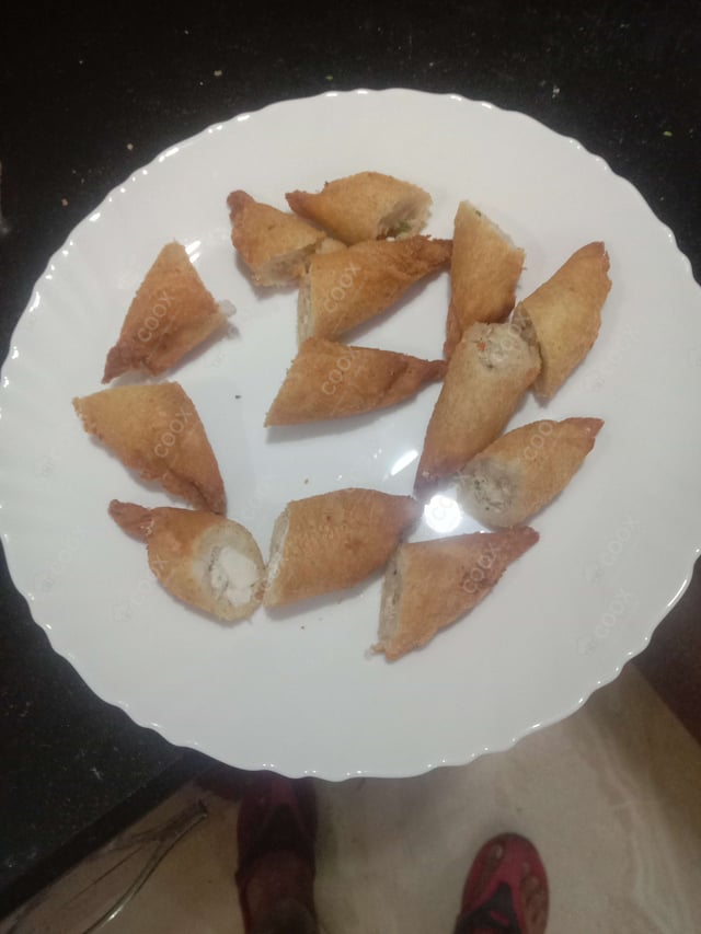 Delicious Dahi ke Sholey prepared by COOX