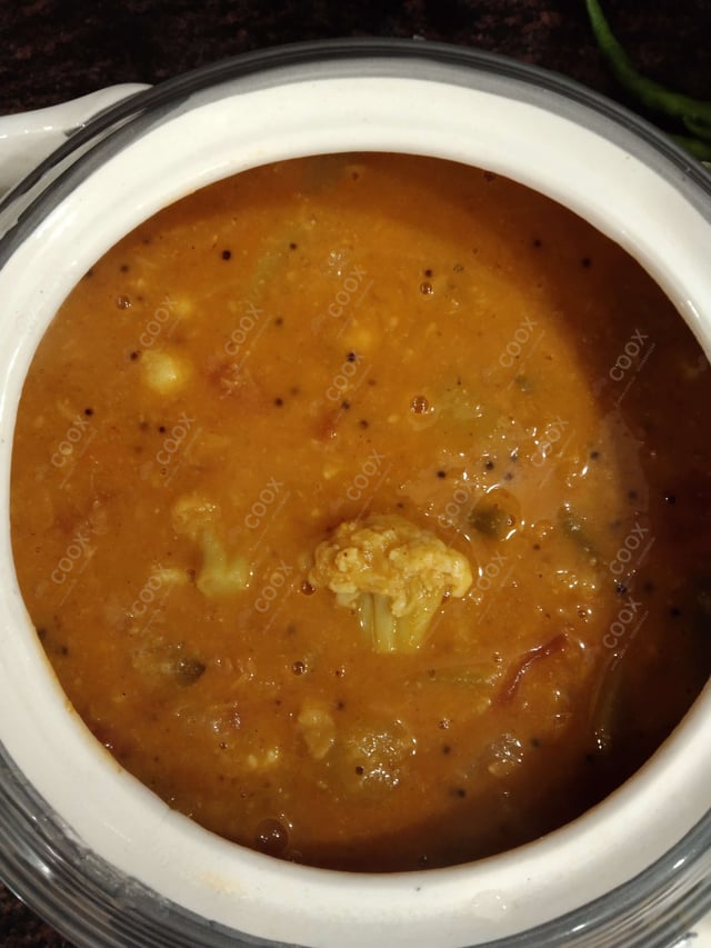 Tasty Sambhar cooked by COOX chefs cooks during occasions parties events at home