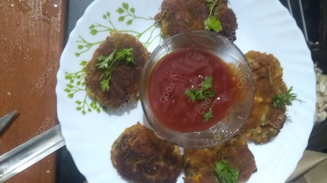 Tasty Veg Cutlets cooked by COOX chefs cooks during occasions parties events at home