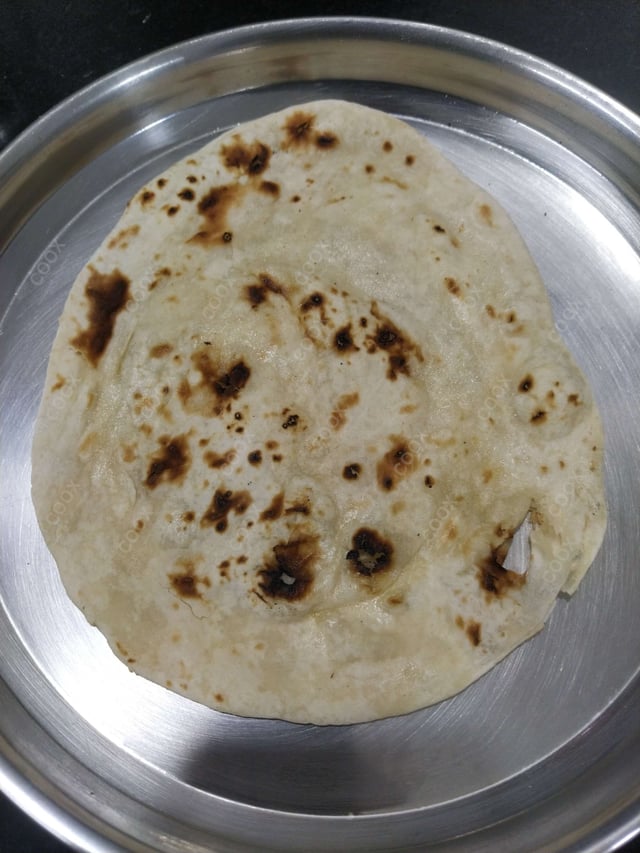 Tasty Naan (Butter / Garlic) cooked by COOX chefs cooks during occasions parties events at home