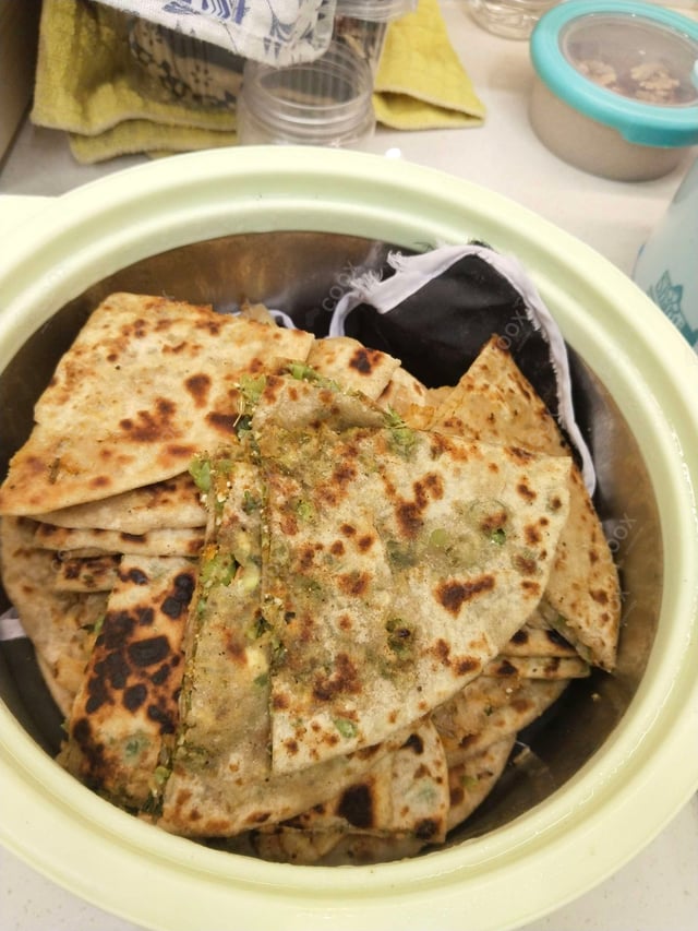 Delicious Stuffed Paranthas prepared by COOX