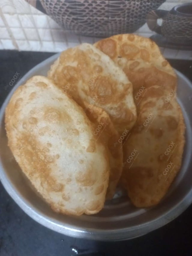 Delicious Chana Bhatura prepared by COOX