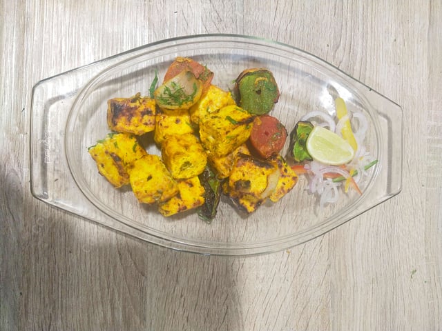 Tasty Paneer Tikka cooked by COOX chefs cooks during occasions parties events at home