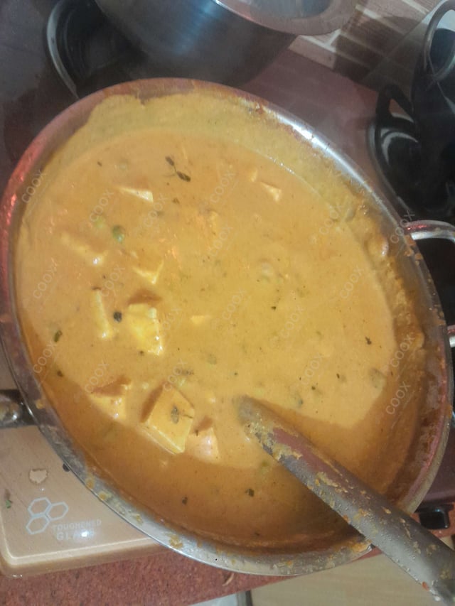Delicious Matar Paneer prepared by COOX