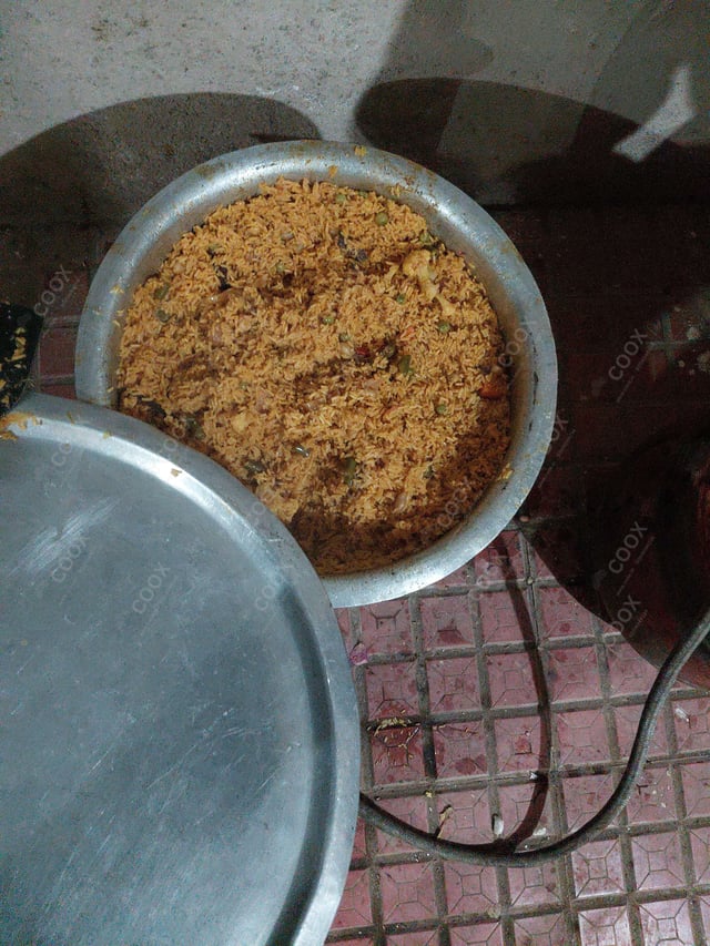 Delicious Veg Biryani prepared by COOX