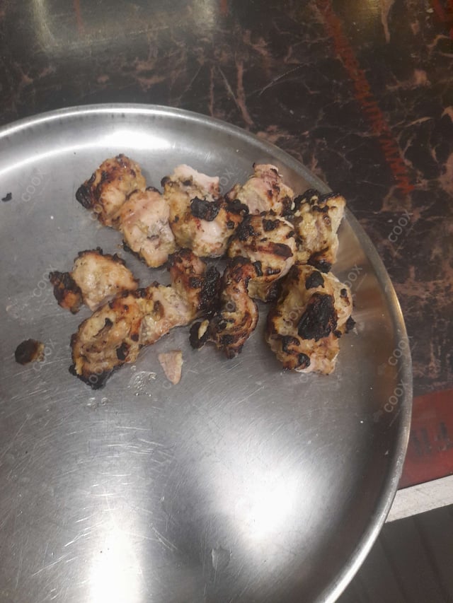 Delicious Murgh Malai Tikka prepared by COOX