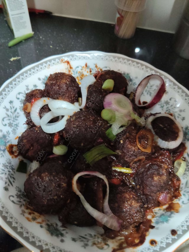 Delicious Veg Manchurian (Gravy) prepared by COOX