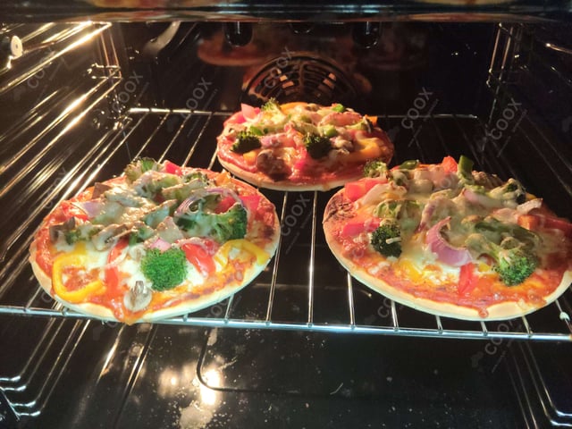Delicious Veg Pizza prepared by COOX