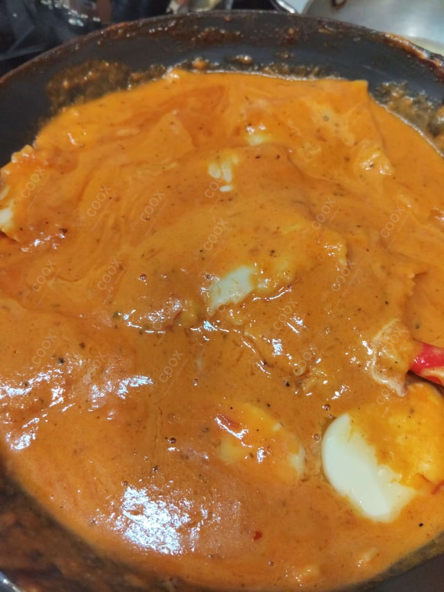 Delicious Ravioli in Pink Sauce prepared by COOX